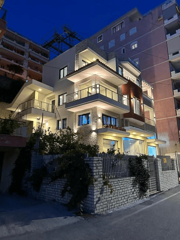 Villa Idrizi — boutique hotel and villa exterior at twilight, Sarandë Albania